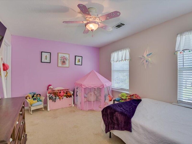 2084 Gardenview Dr, Graniteville, SC 29829 - carpeted bedroom with multiple windows and ceiling fan