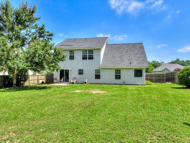 2084 Gardenview Dr, Graniteville, SC 29829 - rear view of property with a fenced backyard, a patio area, and roof with shingles