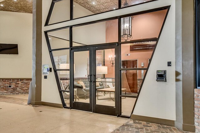 property entrance featuring french doors