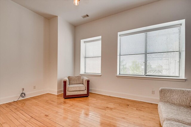 unfurnished room featuring light hardwood / wood-style flooring