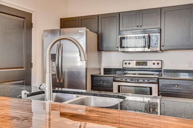 kitchen with stainless steel appliances and sink