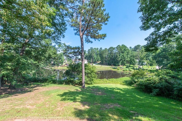 249 Calloway Dr, Evans, GA 30809 - view of green lawn featuring a water view