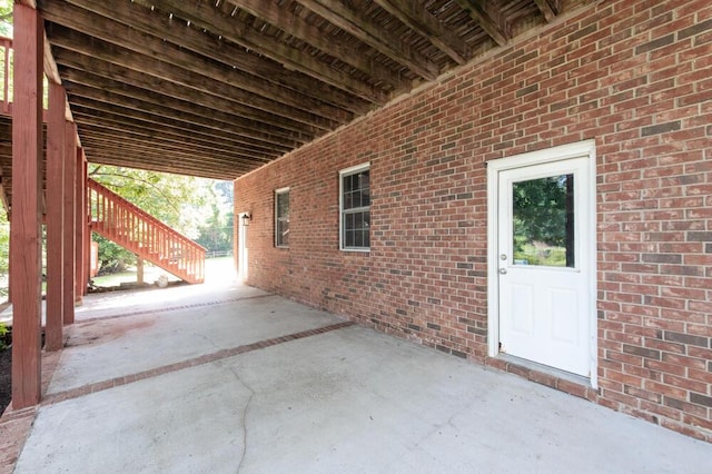 249 Calloway Dr, Evans, GA 30809 - view of patio featuring stairs and a carport