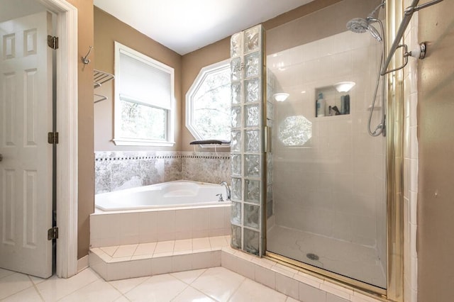 249 Calloway Dr, Evans, GA 30809 - full bathroom with a stall shower, a bath, and tile patterned floors