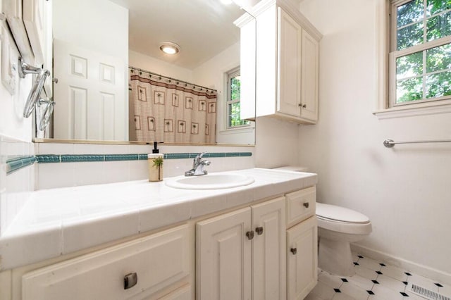 249 Calloway Dr, Evans, GA 30809 - full bathroom featuring vanity, tile patterned floors, and a shower with shower curtain