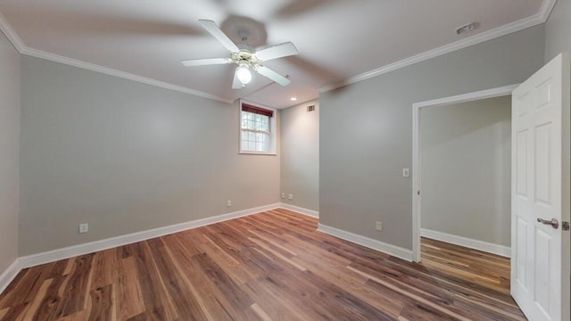 249 Calloway Dr, Evans, GA 30809 - spare room featuring ornamental molding, wood finished floors, and a ceiling fan