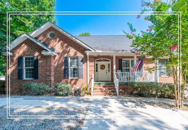249 Calloway Dr, Evans, GA 30809 - view of front of home featuring covered porch and brick siding
