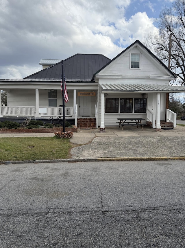 622 Crawford Ave, Augusta, GA 30904 - view of front of property featuring a standing seam roof, metal roof, and covered porch