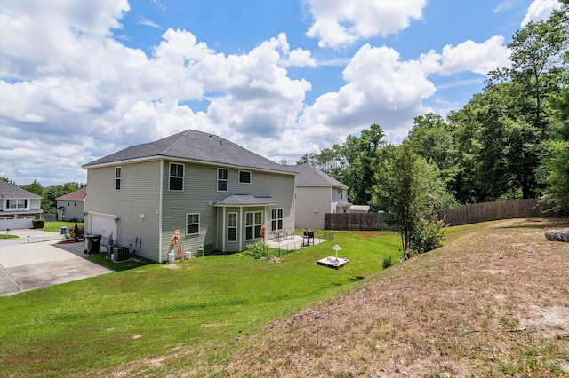 1610 Cedar Hill Dr, Grovetown, GA 30813 - back of property with an attached garage, driveway, and a patio area