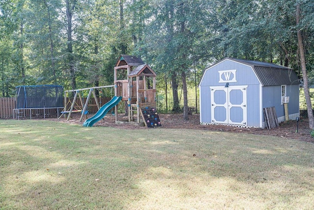 1410 Summit Way, Grovetown, GA 30813 - view of yard with a trampoline, a storage unit, a playground, and view of scattered trees
