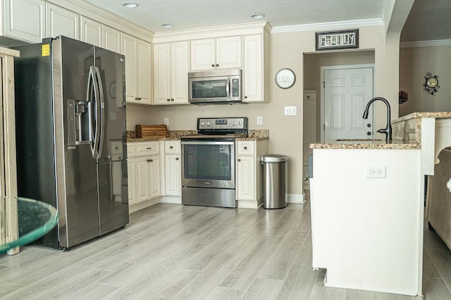 1410 Summit Way, Grovetown, GA 30813 - kitchen with appliances with stainless steel finishes, crown molding, light stone counters, light wood-style floors, and recessed lighting