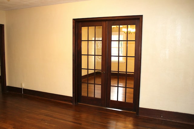 interior space featuring dark wood-type flooring and french doors