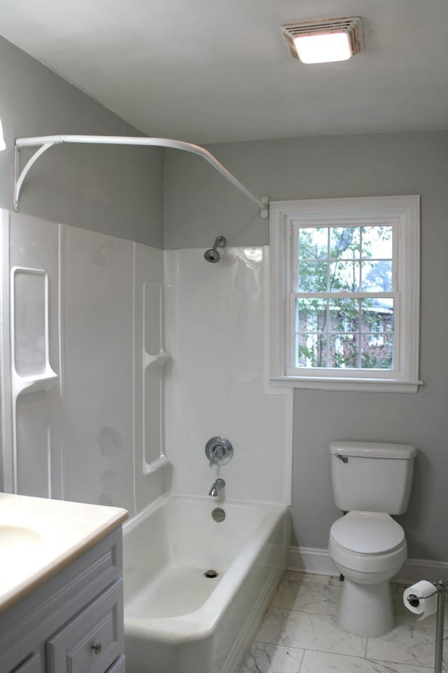 full bathroom featuring vanity,  shower combination, and toilet