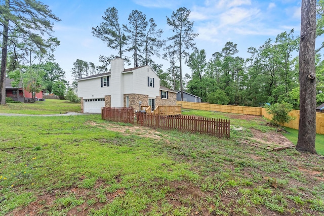 3758 Pine Ridge Run, Martinez, GA 30907 - view of side of property with a garage, a chimney, and driveway