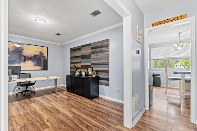 3758 Pine Ridge Run, Martinez, GA 30907 - home office featuring wood finished floors, a chandelier, crown molding, and a textured ceiling