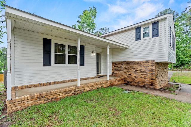 3758 Pine Ridge Run, Martinez, GA 30907 - split level home with brick siding and a front yard