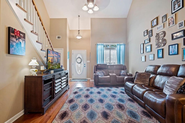 2009 Dundee Way, Grovetown, GA 30813 - living area featuring a towering ceiling, wood finished floors, and stairs