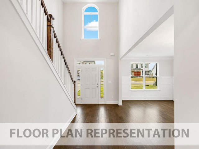 foyer entrance featuring dark hardwood / wood-style flooring