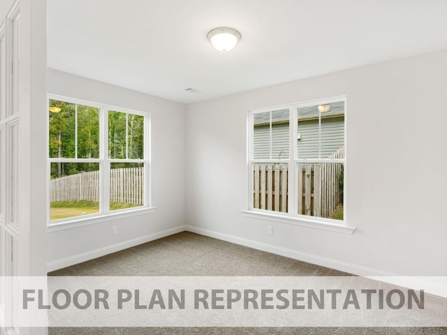 empty room featuring carpet flooring