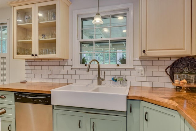 3122 Ramsgate Rd, Augusta, GA 30909 - kitchen with butcher block counters, dishwasher, green cabinets, decorative backsplash, and glass insert cabinets