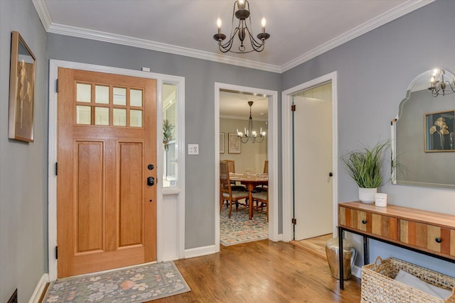 3122 Ramsgate Rd, Augusta, GA 30909 - entryway with a chandelier, wood finished floors, and ornamental molding