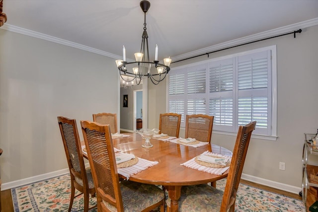 3122 Ramsgate Rd, Augusta, GA 30909 - dining area featuring a chandelier, ornamental molding, and wood finished floors
