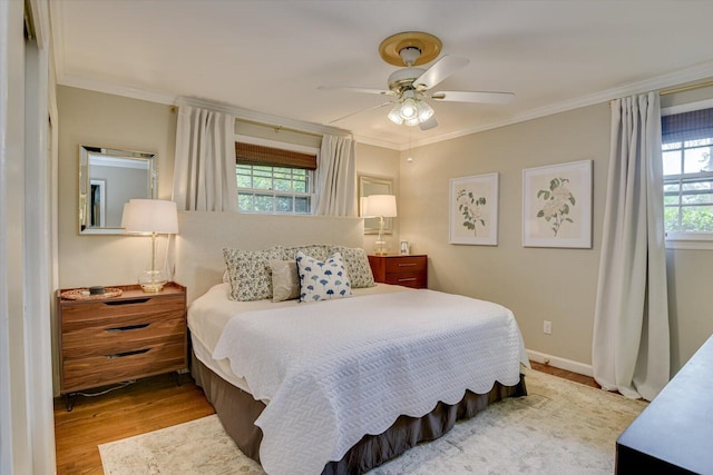 3122 Ramsgate Rd, Augusta, GA 30909 - bedroom with multiple windows, wood finished floors, crown molding, and a ceiling fan