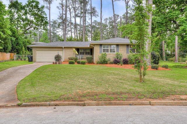 3122 Ramsgate Rd, Augusta, GA 30909 - view of front of house featuring a garage, driveway, a porch, and view of wooded area