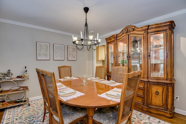 3122 Ramsgate Rd, Augusta, GA 30909 - dining space with a chandelier and crown molding