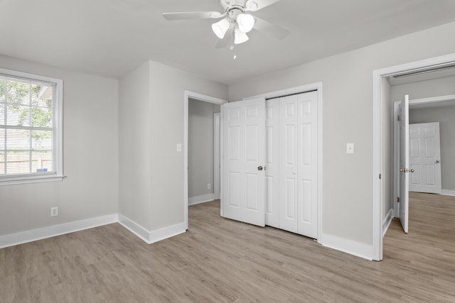 2638 Central Ave, Augusta, GA 30904 - unfurnished bedroom with baseboards, light wood-type flooring, a ceiling fan, and a closet
