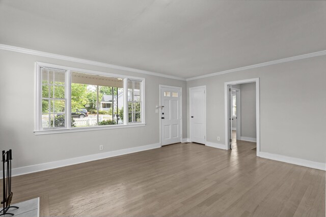 2638 Central Ave, Augusta, GA 30904 - entryway featuring baseboards, ornamental molding, and wood finished floors