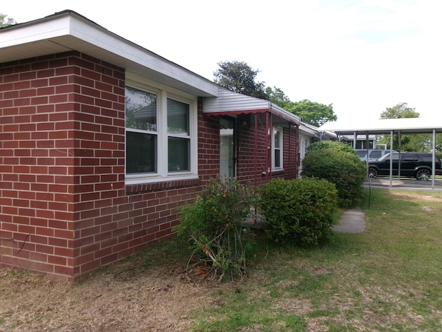 2524 Elderberry Dr, Augusta, GA 30906 - view of home's exterior with a carport and brick siding