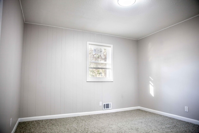 unfurnished room with carpet