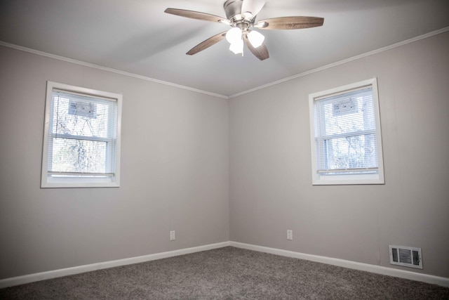 unfurnished room with carpet floors, ornamental molding, and ceiling fan