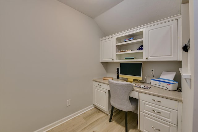 421 Armstrong Way, Evans, GA 30809 - office with built in study area, light wood-style floors, lofted ceiling, and baseboards