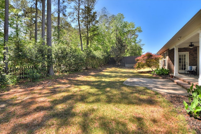 421 Armstrong Way, Evans, GA 30809 - view of yard with a ceiling fan and a patio