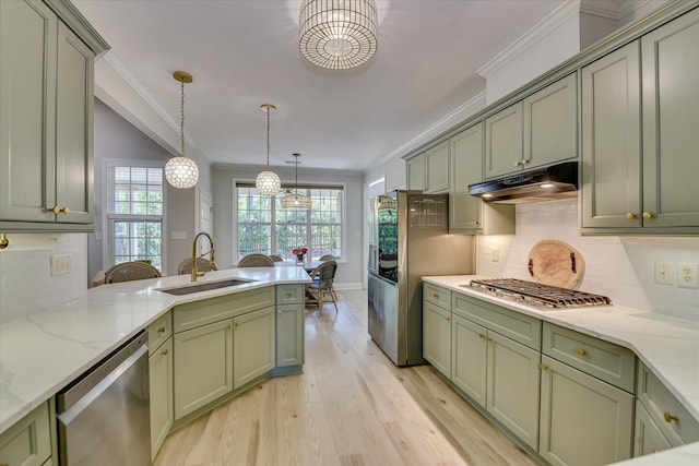 421 Armstrong Way, Evans, GA 30809 - kitchen with green cabinetry, under cabinet range hood, a sink, stainless steel appliances, and light wood-type flooring