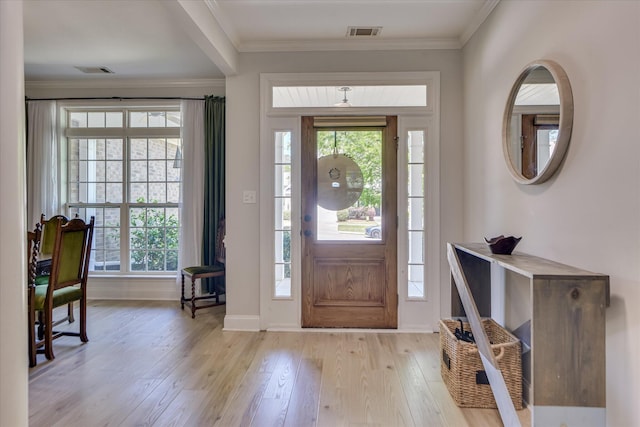 421 Armstrong Way, Evans, GA 30809 - entryway featuring baseboards, light wood-type flooring, healthy amount of natural light, and ornamental molding