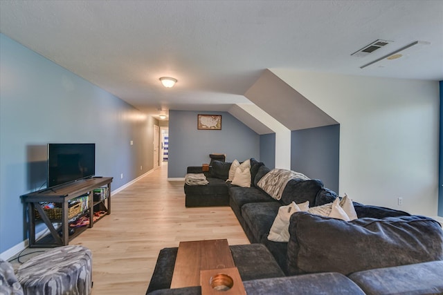 421 Armstrong Way, Evans, GA 30809 - living area featuring light wood-type flooring and baseboards