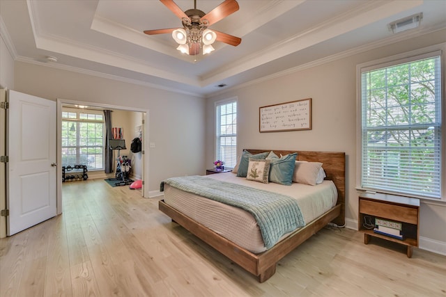 421 Armstrong Way, Evans, GA 30809 - bedroom featuring a raised ceiling, light wood finished floors, crown molding, baseboards, and ceiling fan