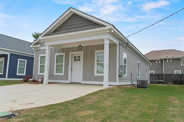 239 Walker St, Augusta, GA 30901 - shotgun-style home featuring board and batten siding and central air condition unit