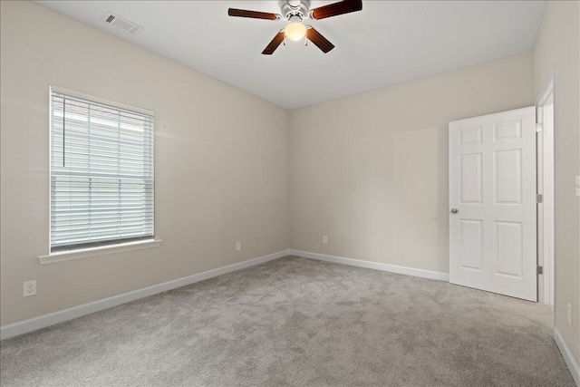 239 Walker St, Augusta, GA 30901 - unfurnished room featuring a ceiling fan, plenty of natural light, carpet flooring, and baseboards