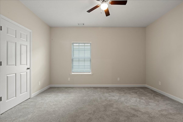 239 Walker St, Augusta, GA 30901 - empty room with carpet floors, a ceiling fan, and baseboards