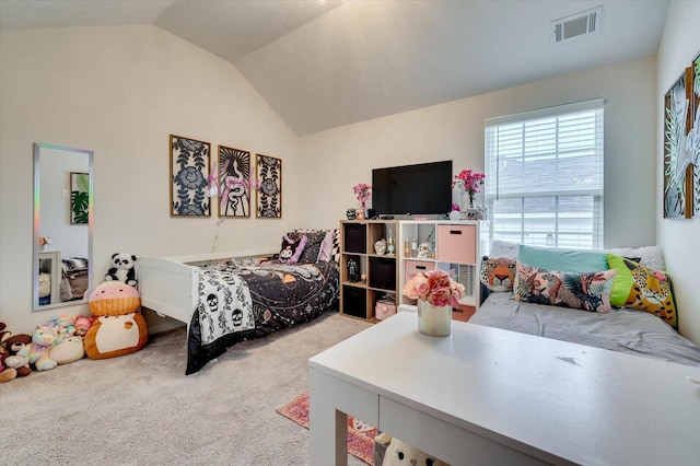 bedroom featuring light carpet and lofted ceiling