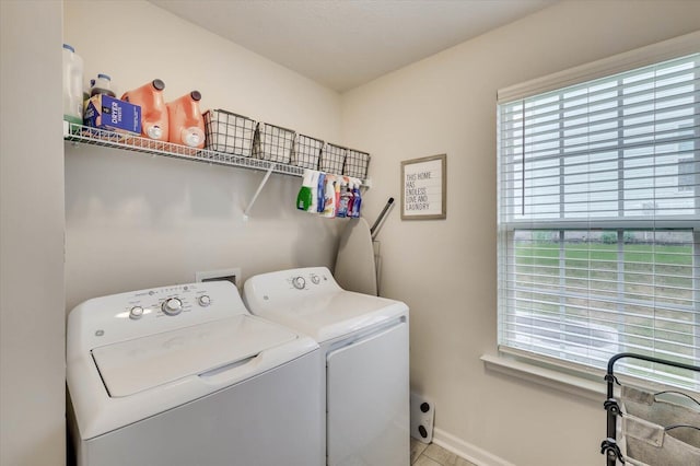 laundry area with separate washer and dryer