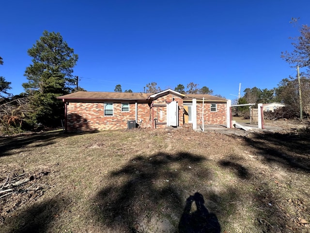 view of front of property featuring cooling unit