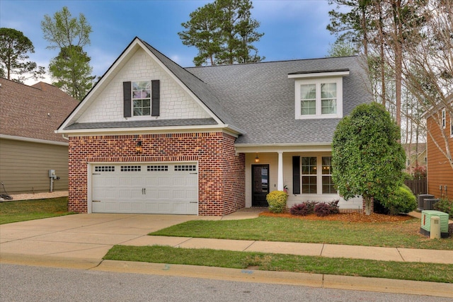 951 Napiers Post Dr, Evans, GA 30809 - view of front of property with roof with shingles, brick siding, concrete driveway, and a front lawn