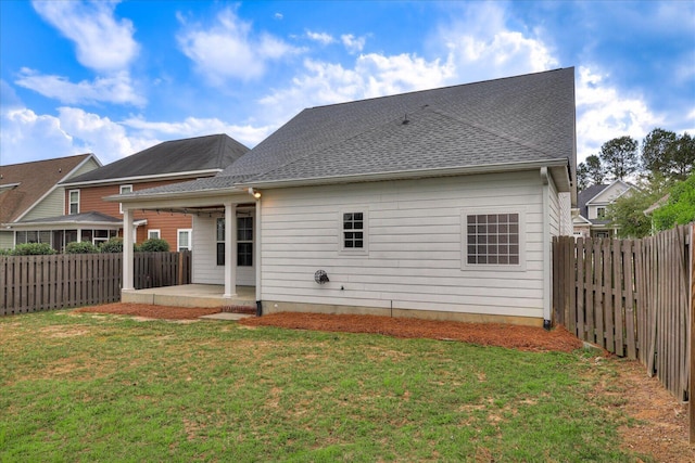 951 Napiers Post Dr, Evans, GA 30809 - rear view of house with a patio, a fenced backyard, and a shingled roof