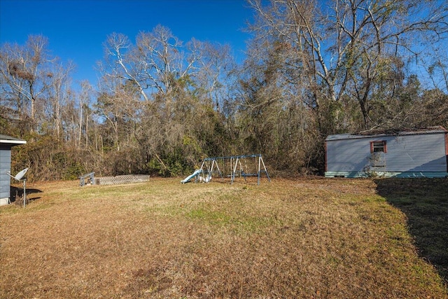 view of yard with a playground