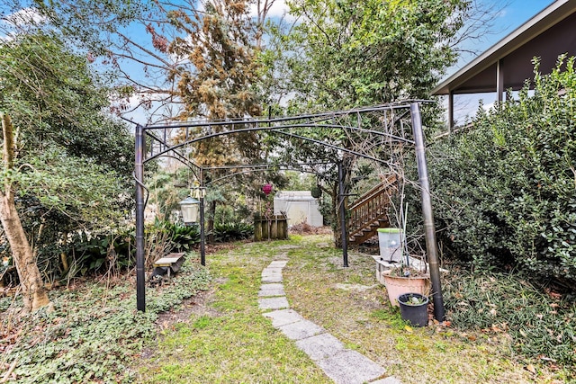 view of yard featuring stairs